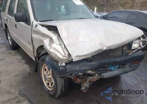 1997 Isuzu Rodeo S 2.6L z USA, uszkodzony, nr VIN 4S2CK58E5V4322383